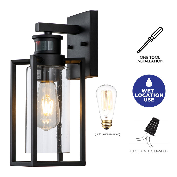 1-Light Matte Black Motion Sensing Dusk to Dawn Outdoor Wall Lanten with Clear Seeded Glass Cylinder