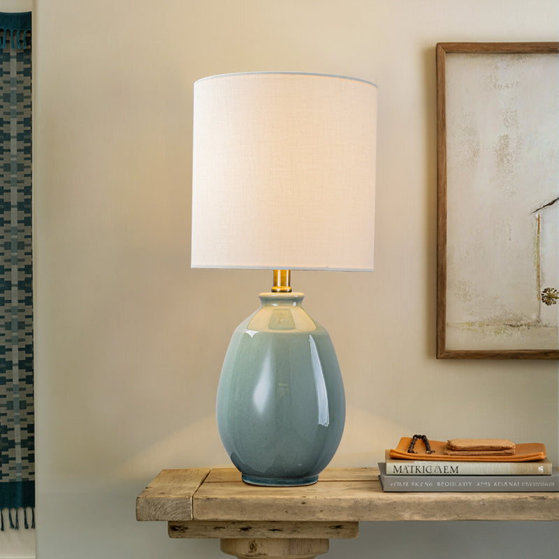 C Cattleya 19in. Celadon Green Crackle Glaze Ceramic Table Lamp with Yellow Linen Shade and Brass Finish Lamp Neck