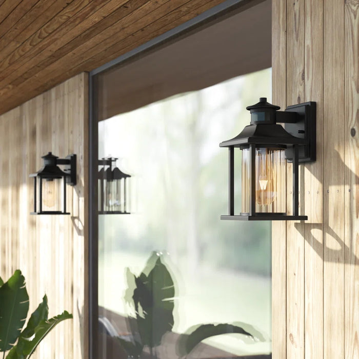 2-Pack Matte Black Motion Sensing Dusk to Dawn Outdoor Wall Sconce with Clear Stripped Glass