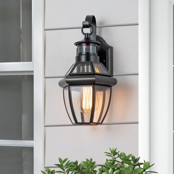 1-Light Black Finisih Metal and Brass Motion Sensing Dusk to Dawn Outdoor Wall Lantern with Tempered Clear Glass Shade